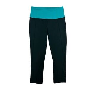 Lululemon Cropped Leggings in Black With Teal Waistband Size 2 RARE